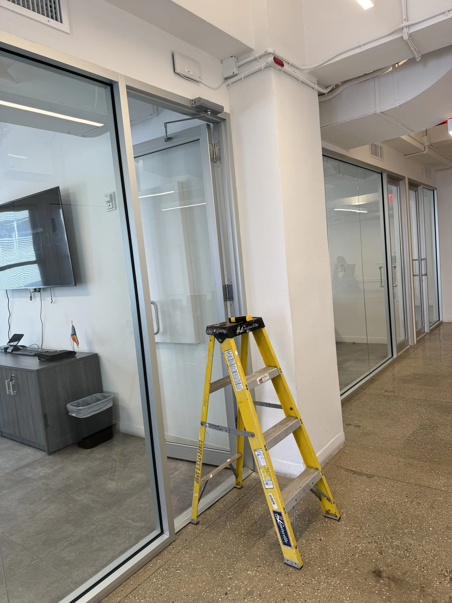 Wireless access point installed outside a conference room in Westchester